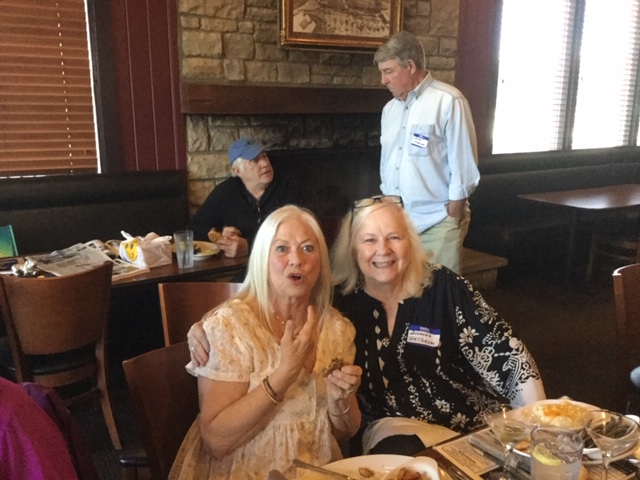 Sharon Sickels and Suzanne Wellbaum with John Landsiedel Class of '67 and Dwight in the background.