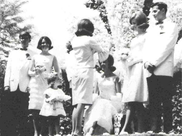 1965 May Day Queen Cris Dabbelt being crowned by the 1964 Queen, Karen Bernt. 