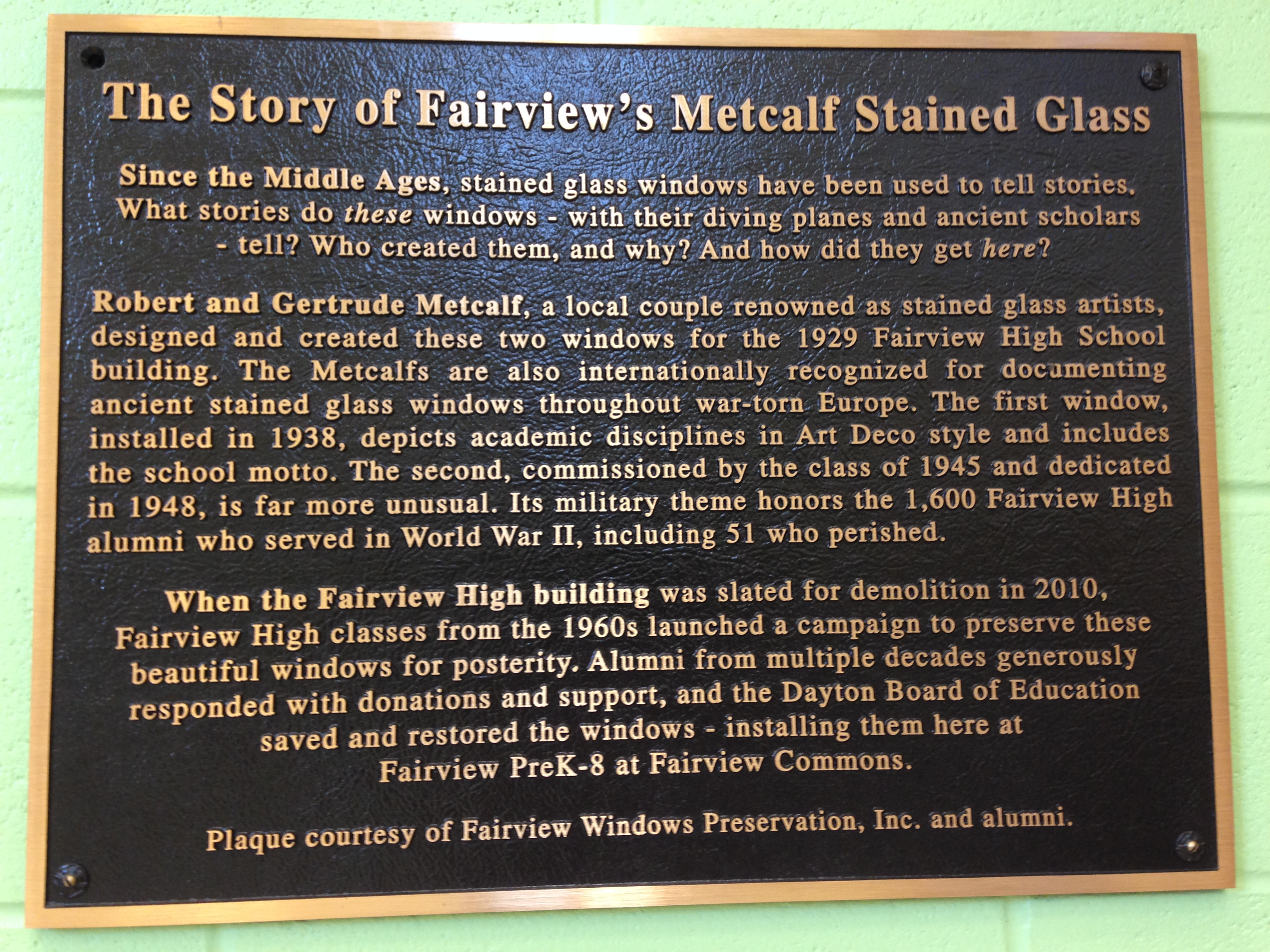 Bronze plaque purchased to be displayed with the Metcalf stained glass in the new Fairview PreK-8 School and accompany the stained glass into the future. The plaque was made possible from donations made by Fairview High School Alumni to Fairview Windows P